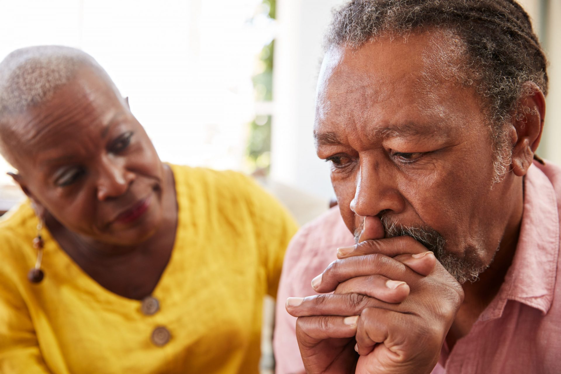 elderly couple talking