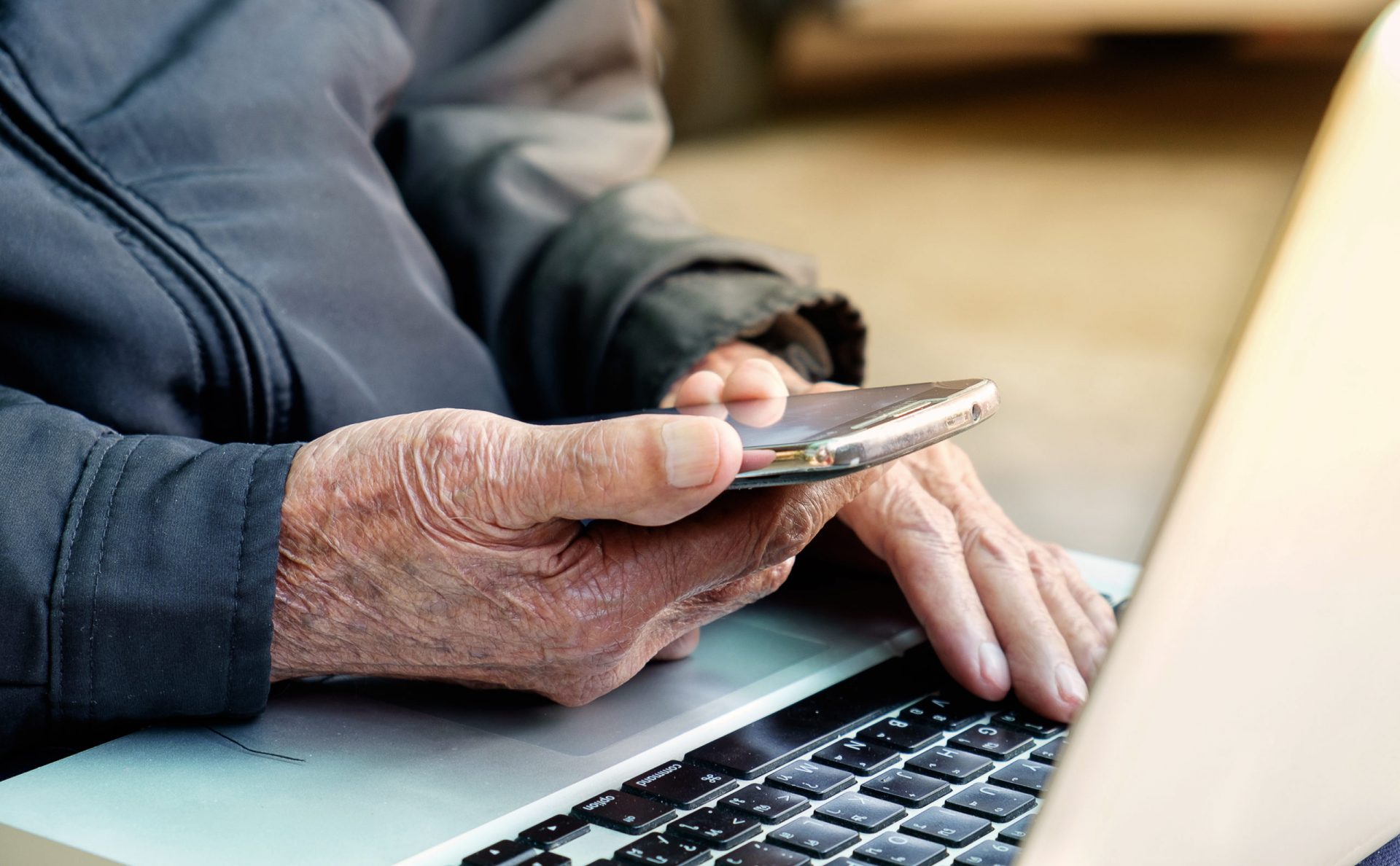 elderly person on cell phone