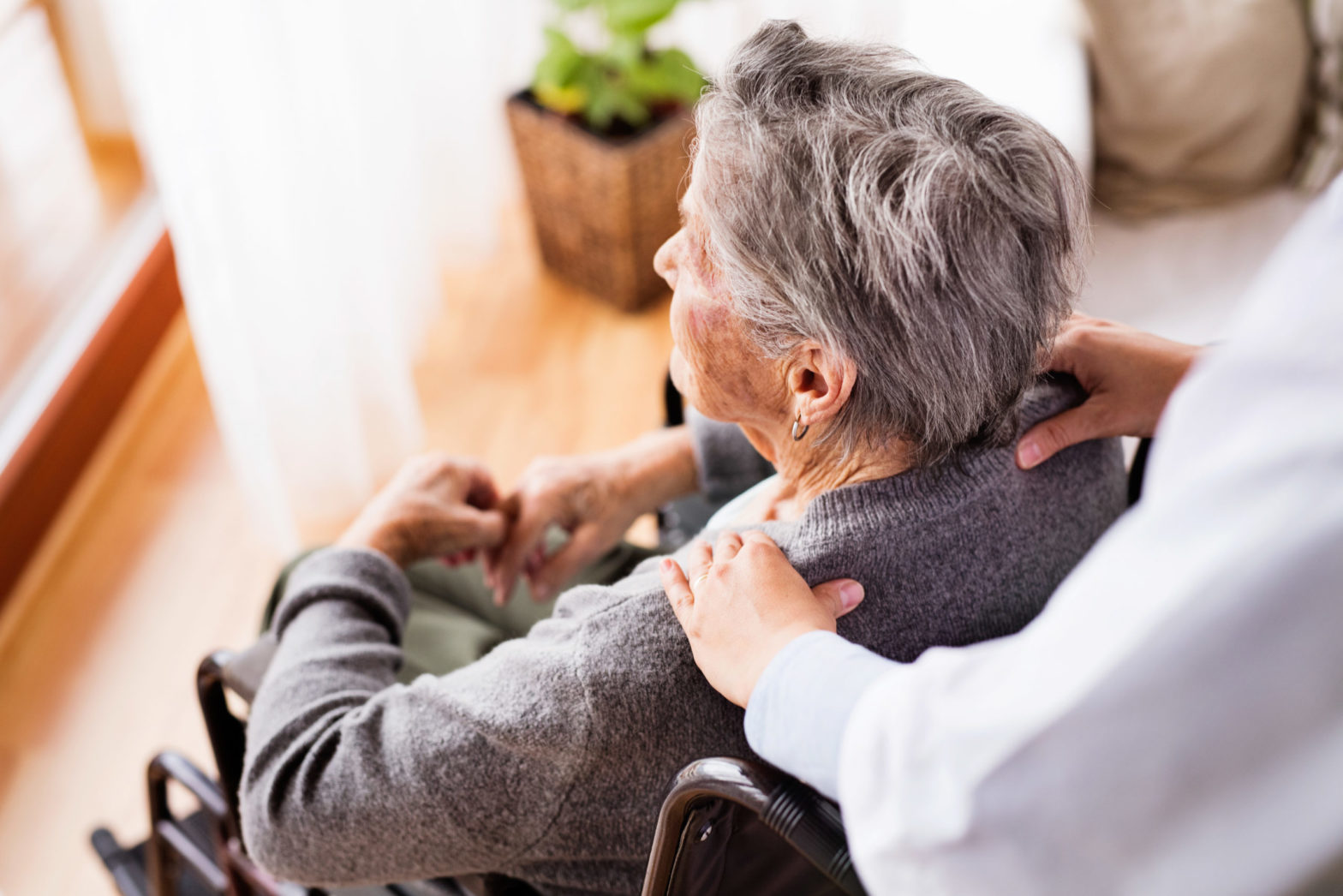 elderly woman in wheelchair