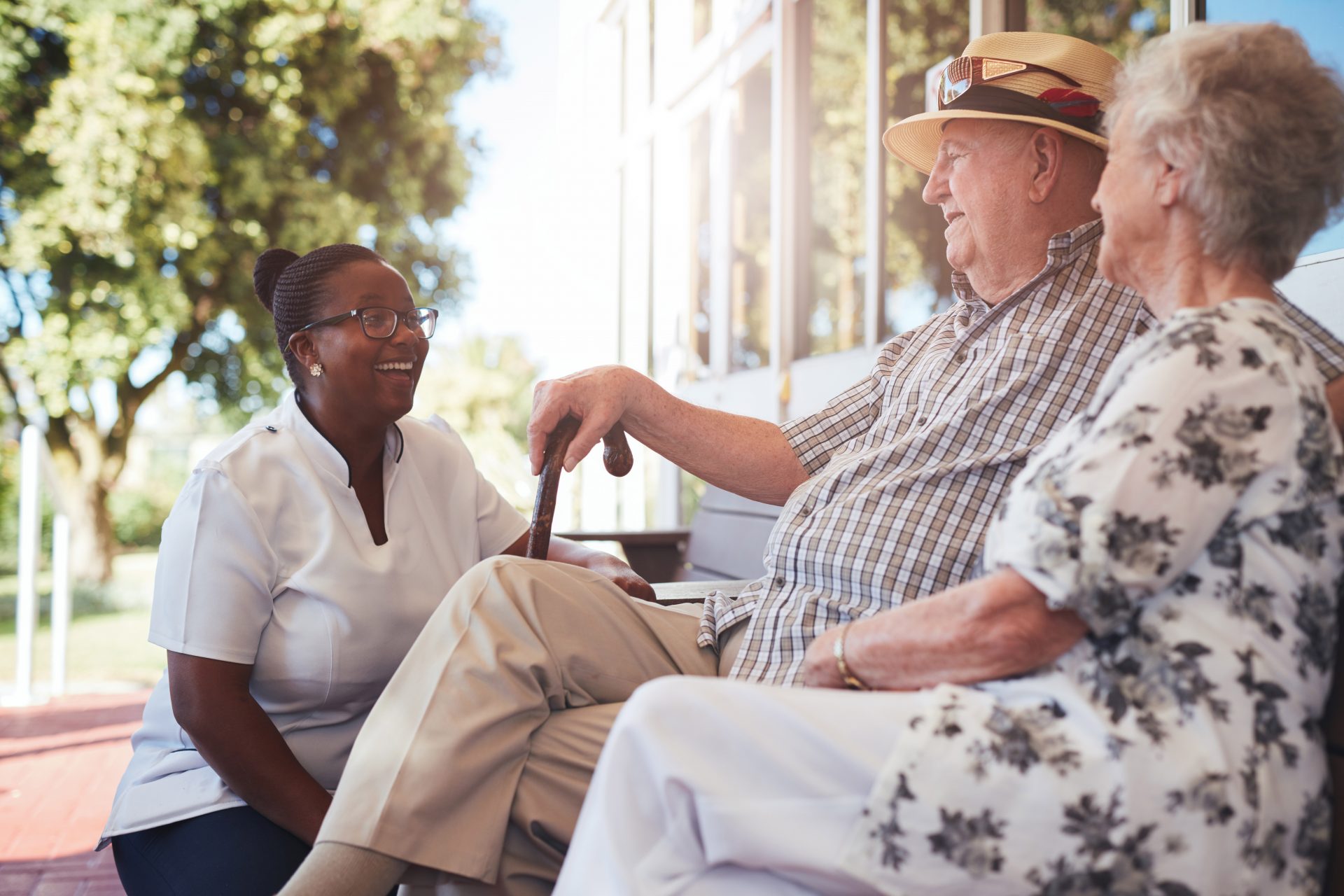 nurse talking with couple sitting down