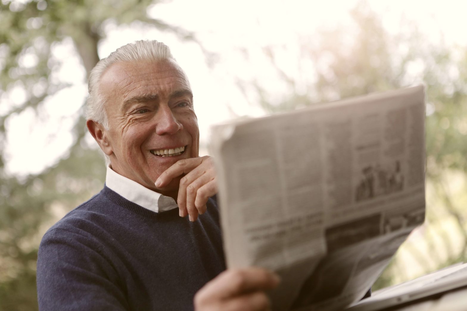 Senior reading the newspaper