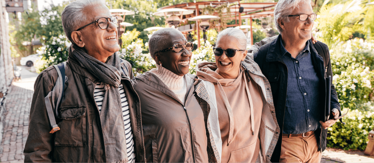 group of senior friends enjoying an outdoor walk