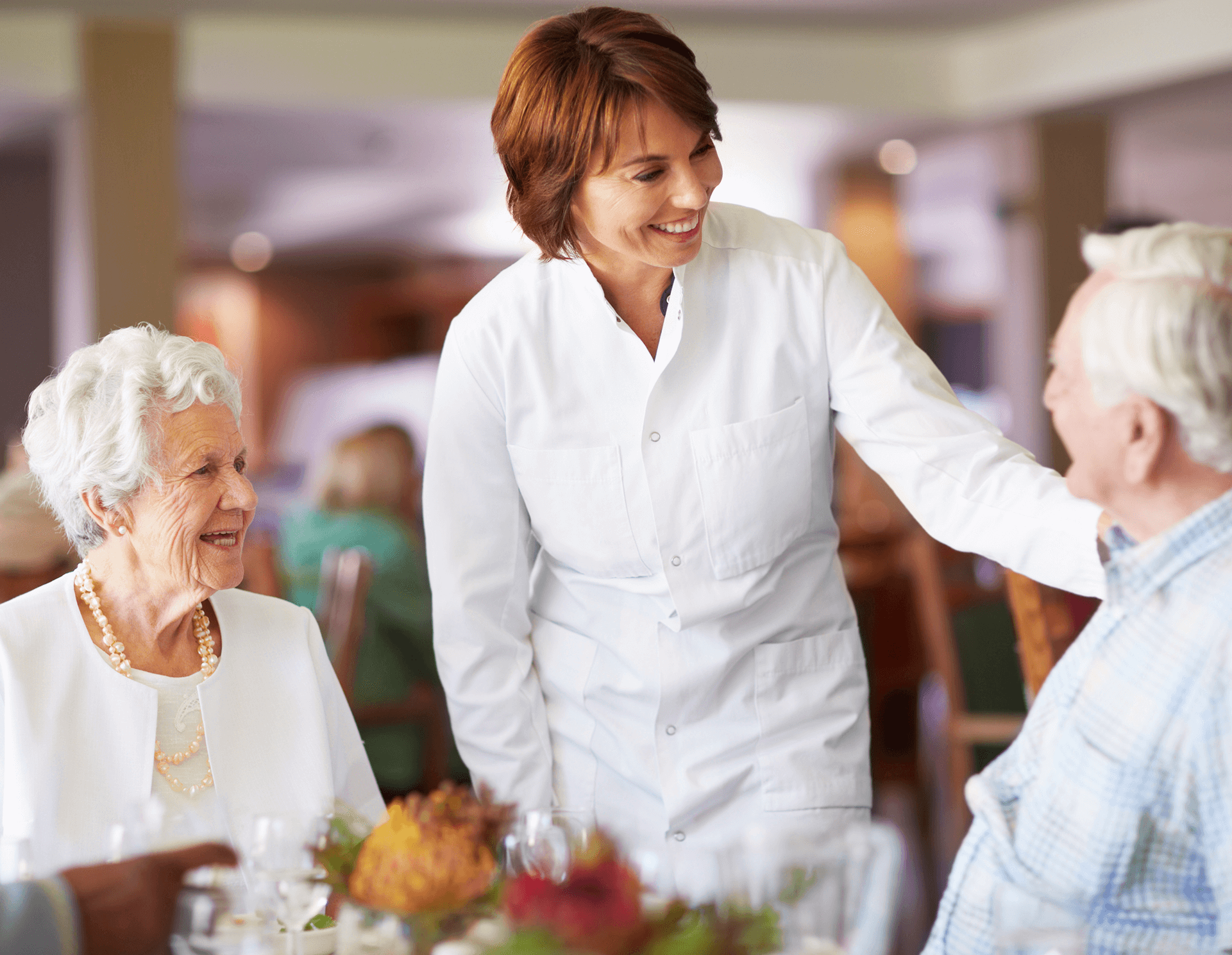 chef talking with couple