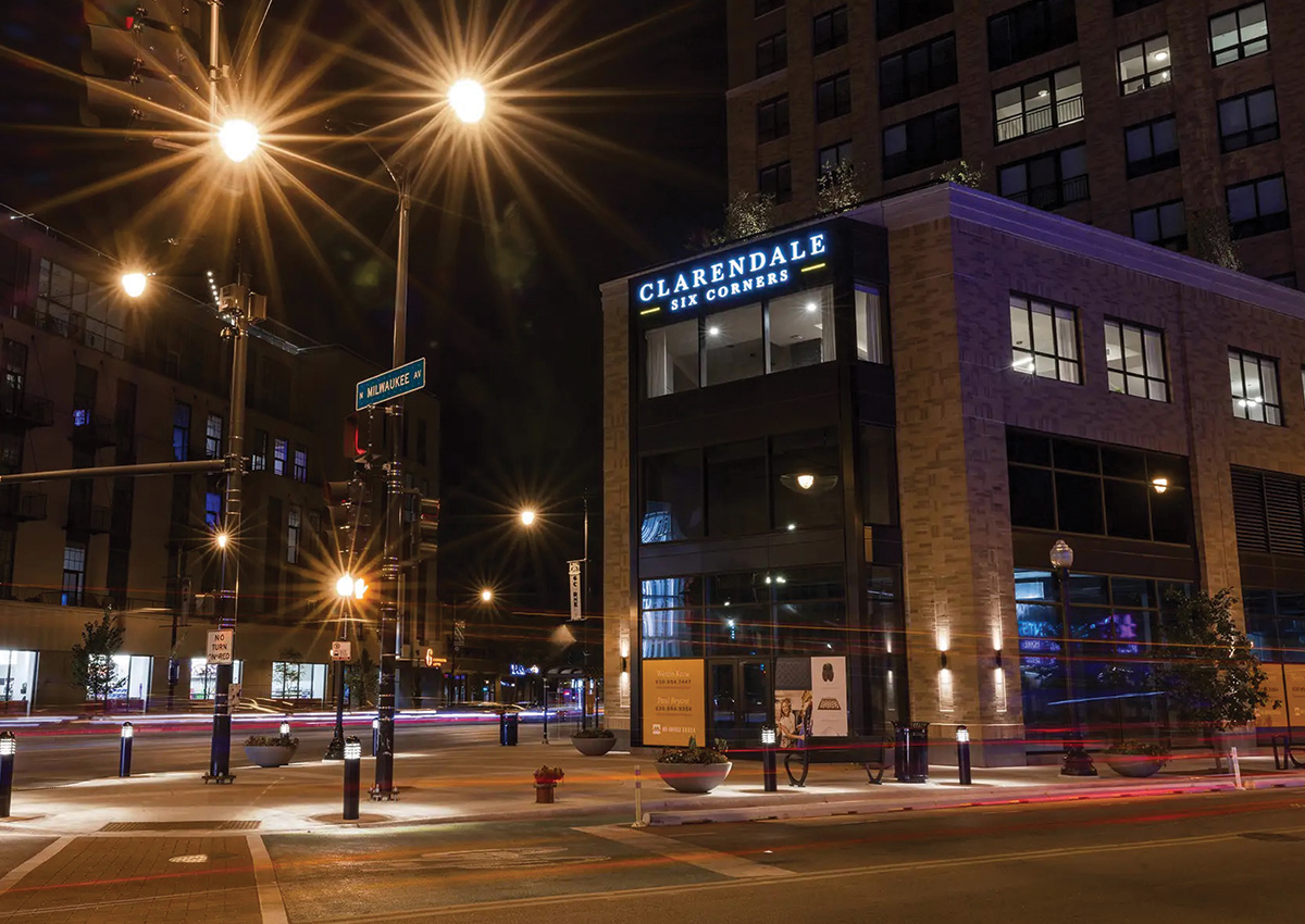 Clarendale Six Corners entrance at night time